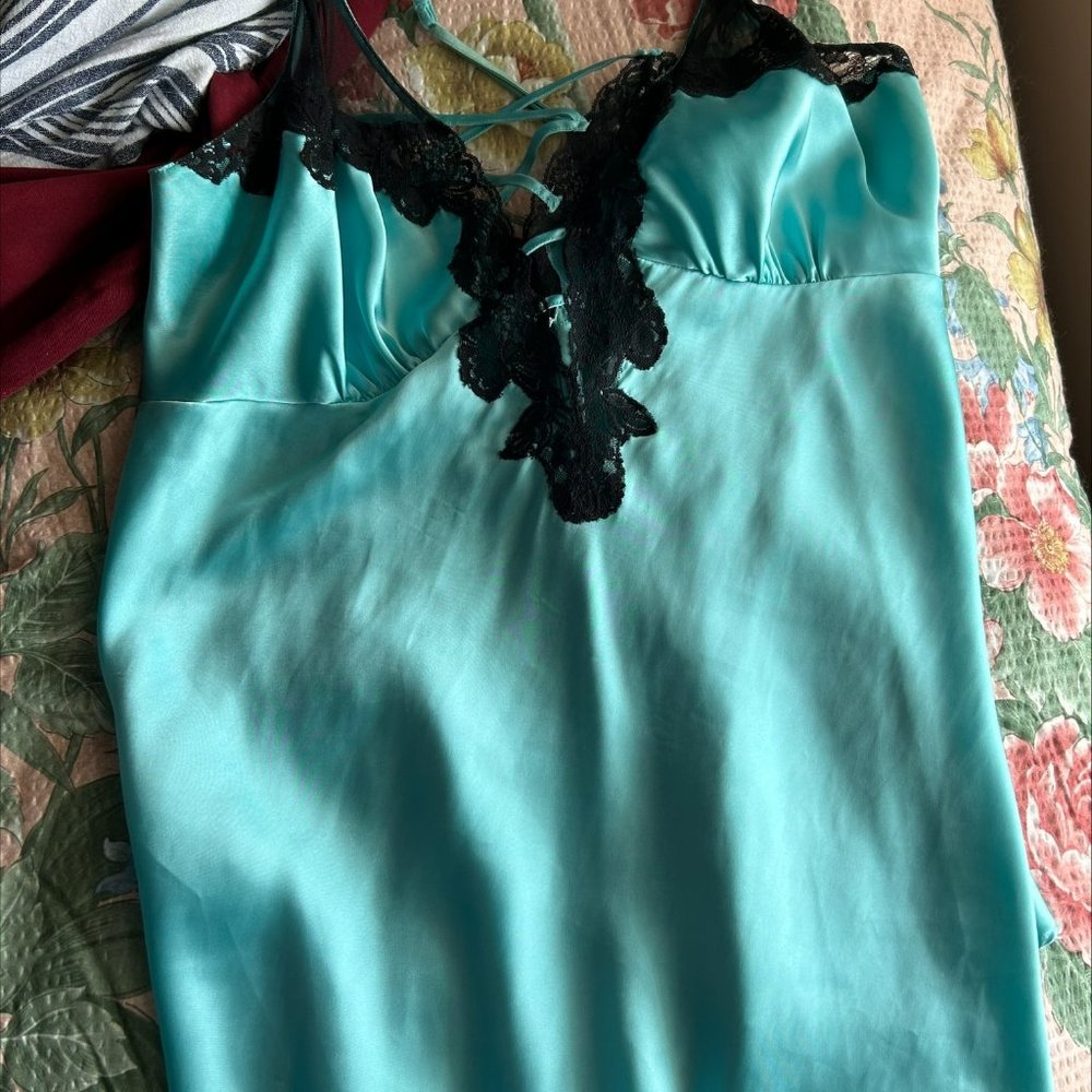 Short night gown with crisscross straps on back.